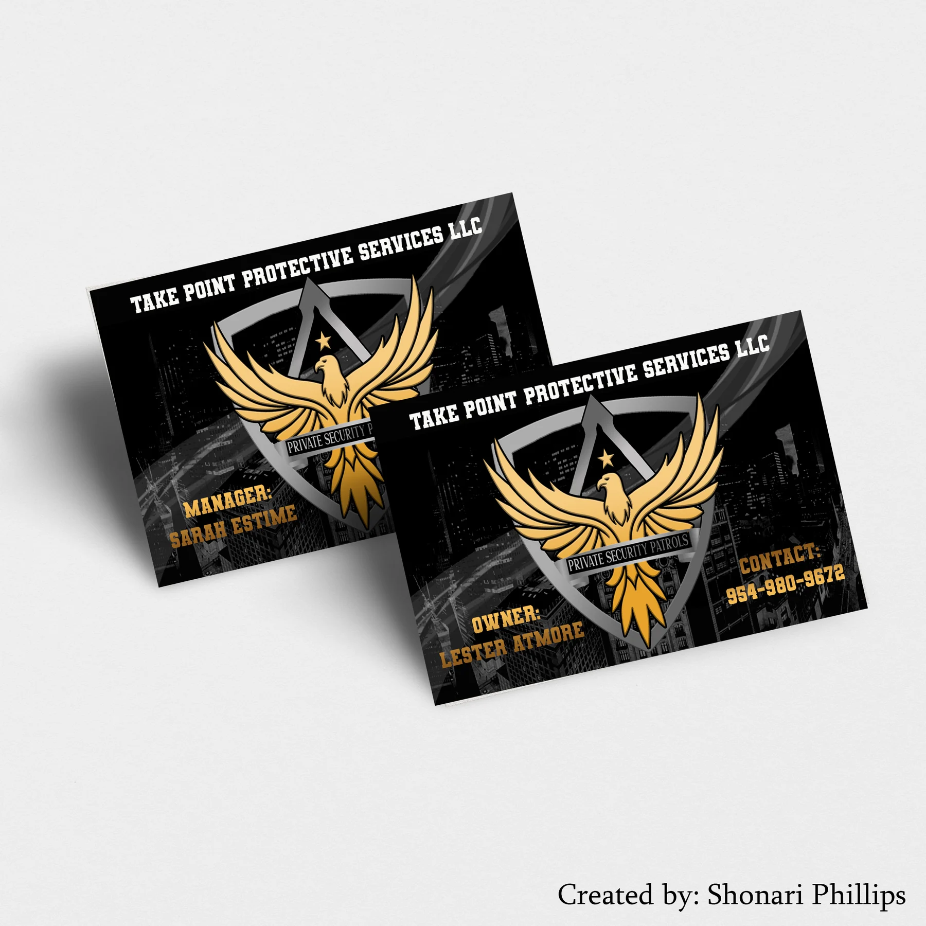 Pair of black business cards for Take Point Protective Services with a gold phoenix shield logo.